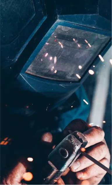 a hand holding a gun